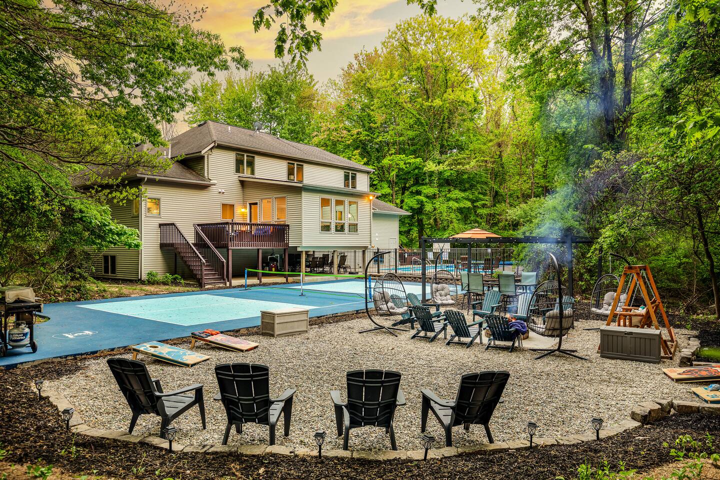 Hot tub and fire pit at dusk